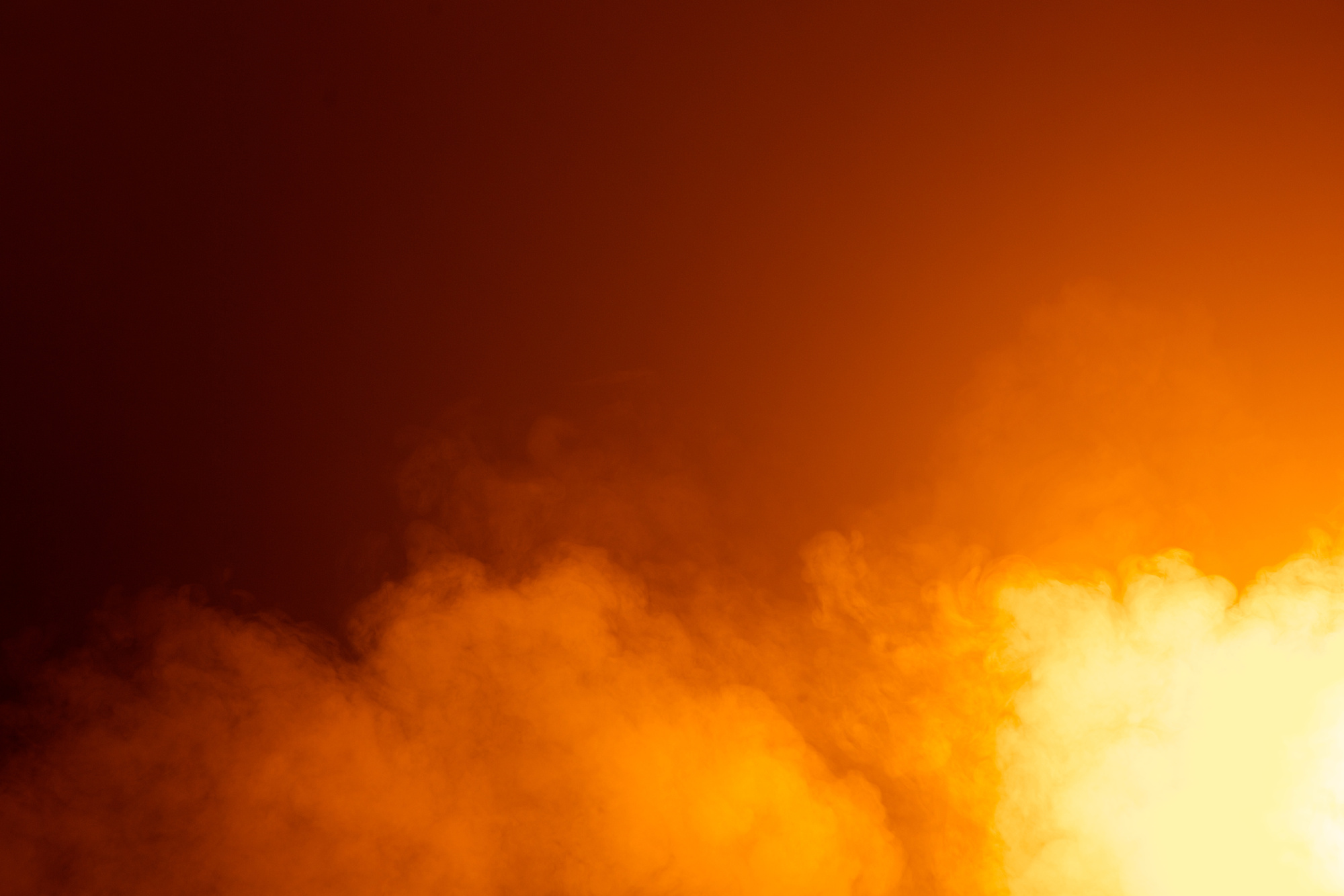 Bright Orange Fog on Dark Background